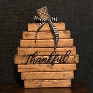 Wood pumpkin shaped decor .